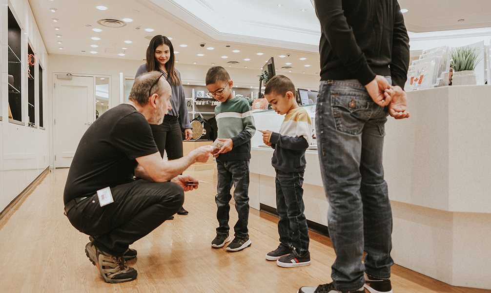 Photo of people shopping at the Ottawa Mint Boutique.