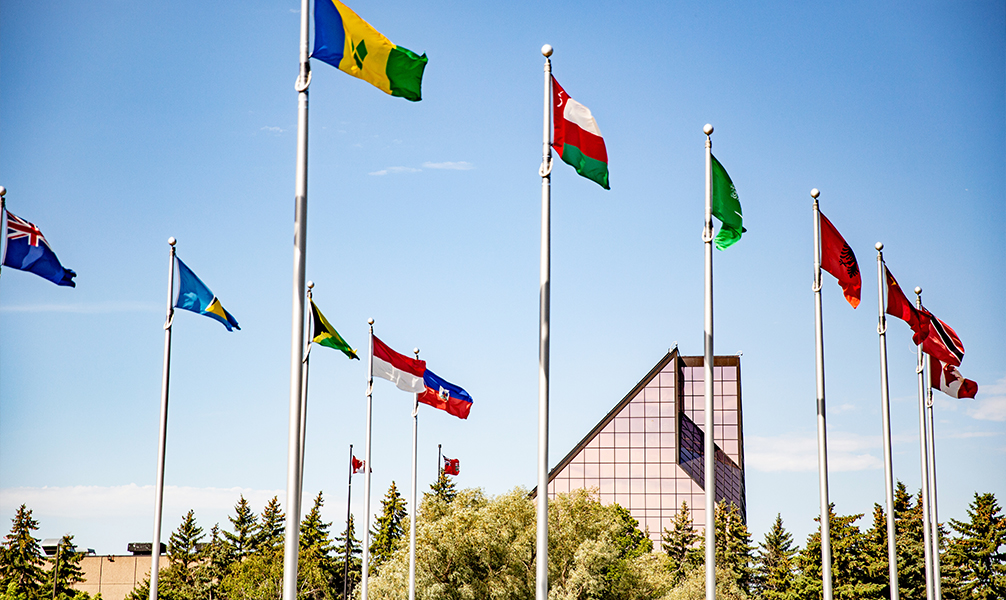 Photo of various flags outside the Winnipeg Mint.